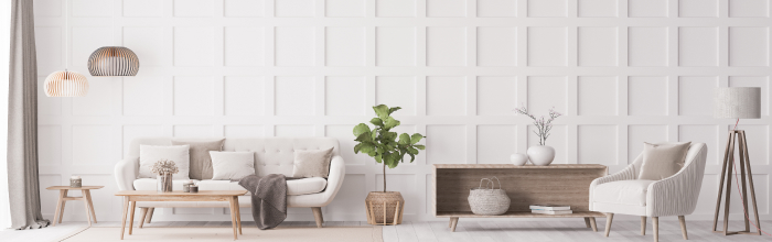 Ein schlichtes und modernes Wohnzimmer mit einer Farbkombination von weiß und braun
